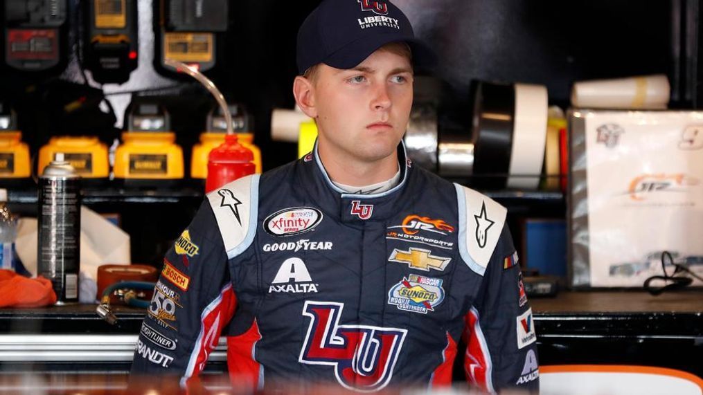 William Byron stands in the garage area during practice for the NASCAR Xfinity Series auto race, Friday, July 28, 2017, at Iowa Speedway in Newton, Iowa. (AP Photo/Charlie Neibergall)