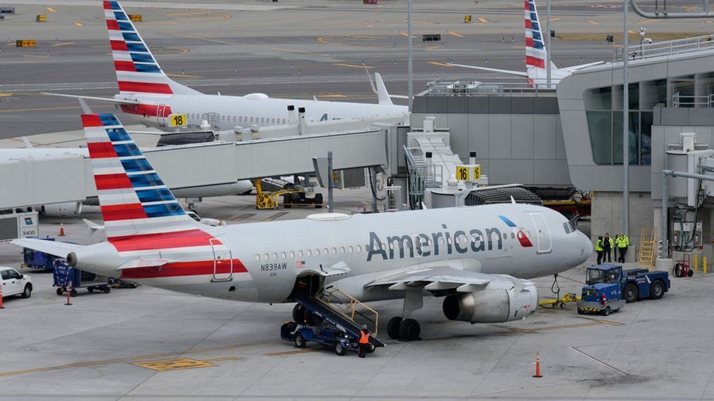 FILE - American Airlines planes sit on the tarmac at Terminal B at LaGuardia Airport, Jan. 11, 2023, in New York. (AP Photo/Seth Wenig, File)