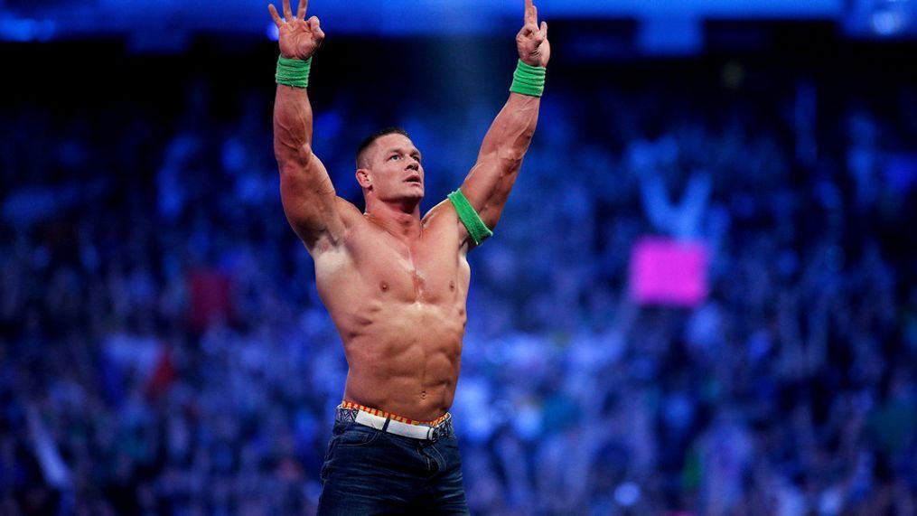 FILE- John Cena celebrates his win during Wrestlemania XXX in New Orleans on April 6, 2014. (Jonathan Bachman/AP Images for WWE, File)