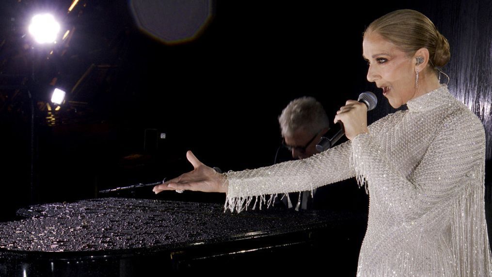 This photo released by the Olympic Broadcasting Services shows Canadian Singer Celine Dion performing at the Eiffel Tower during the opening ceremony for the 2024 Summer Olympics in Paris, France, Friday, July 26, 2024. (Olympic Broadcasting Services via AP)