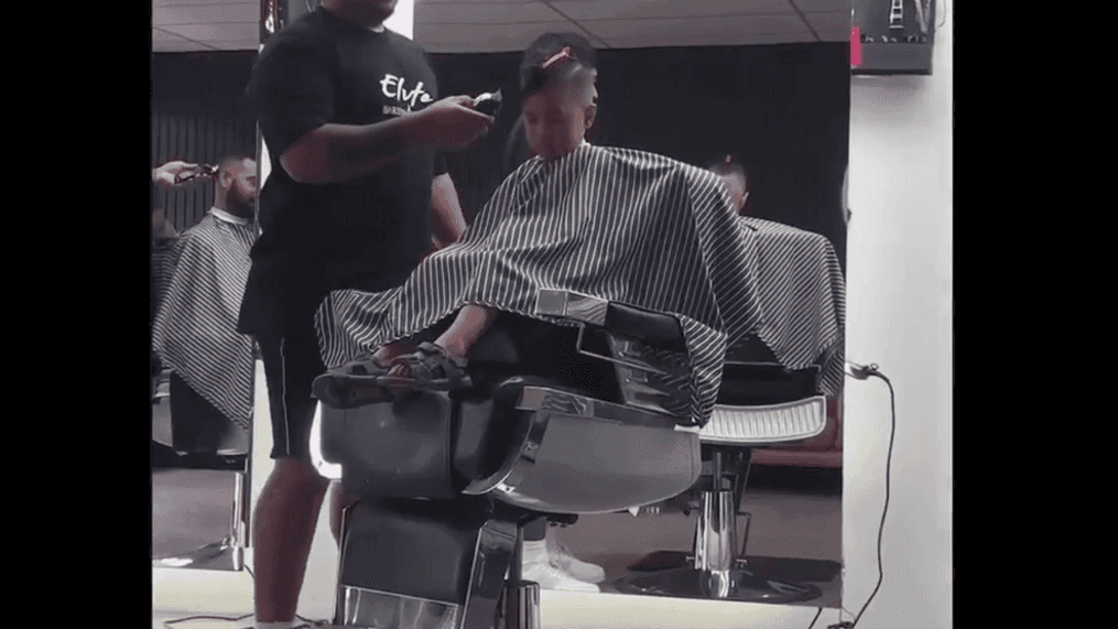 Young boy falls asleep in barber chair while getting haircut (Courtesy: Rangi Thompson)