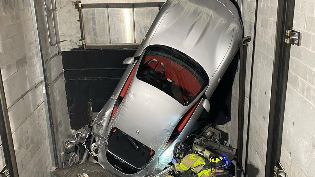 Elevator malfunction leaves Ferrari hanging at 'high-end' dealership in Florida (Photo: Palm Beach County Fire Rescue){&nbsp;}