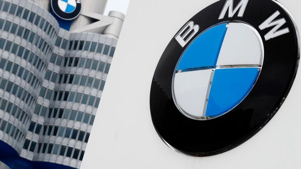 In this March 21, 2018 file photo shows the logo of German car manufacturer BMW visible at the headquarters in Munich, Germany. German automaker BMW said Tuesday that its first quarter profit sagged by 74 percent as earnings were hit by a 1.4 billion-euro ($1.6 billion) set-aside for an anti-trust fine from the European Commission and by higher up-front costs for new technology and factories.(AP Photo/Matthias Schrader)