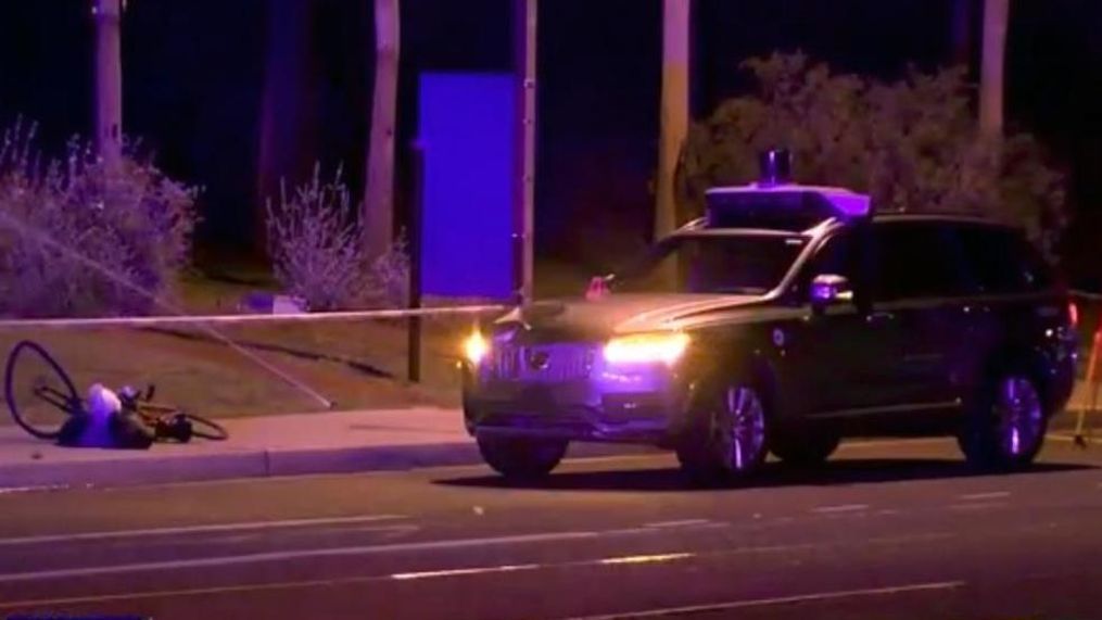 This March 19, 2018 still image taken from video provided by ABC-15, shows investigators at the scene of a fatal accident involving a self driving Uber car on the street in Tempe, Ariz. Police in the city of Tempe said Monday, March 19, 2018, that the vehicle was in autonomous mode with an operator behind the wheel when the woman walking outside of a crosswalk was hit. (ABC-15.com via AP)