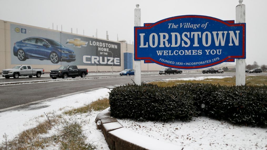 In this Nov. 27, 2018, file photo a banner depicting the Chevrolet Cruze model vehicle is displayed at the General Motors' Lordstown plant in Lordstown, Ohio. General Motors reports financial results Wednesday, Feb. 6, 2019. (AP Photo/John Minchillo, File)