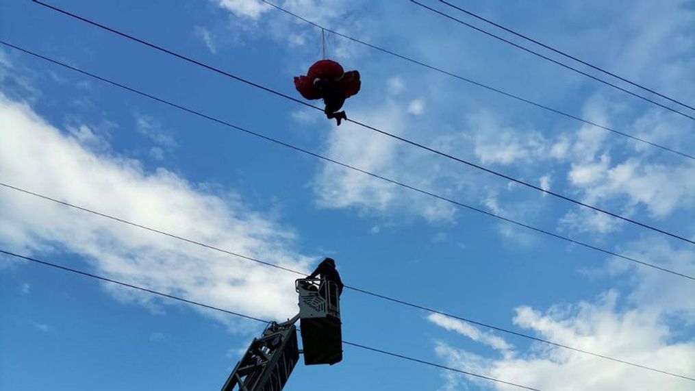 A paraglider was rescued after being caught in power lines on June 8 in Romania. (Inspectorate for Emergency Situations:Zenger News)