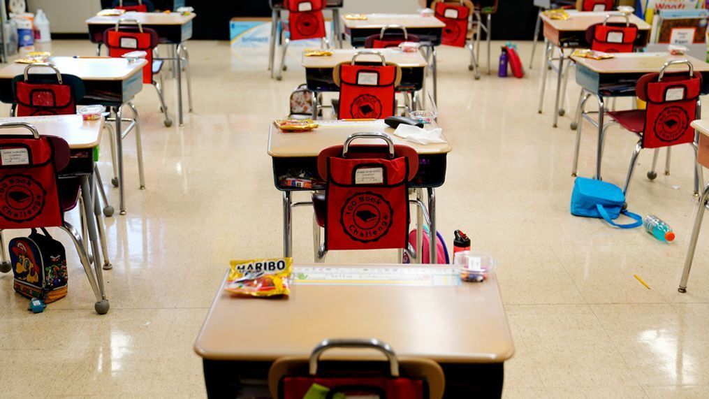 FILE - Desks are arranged in a classroom at an elementary school in Nesquehoning, Pa., March 11, 2021. (AP Photo/Matt Slocum, File)