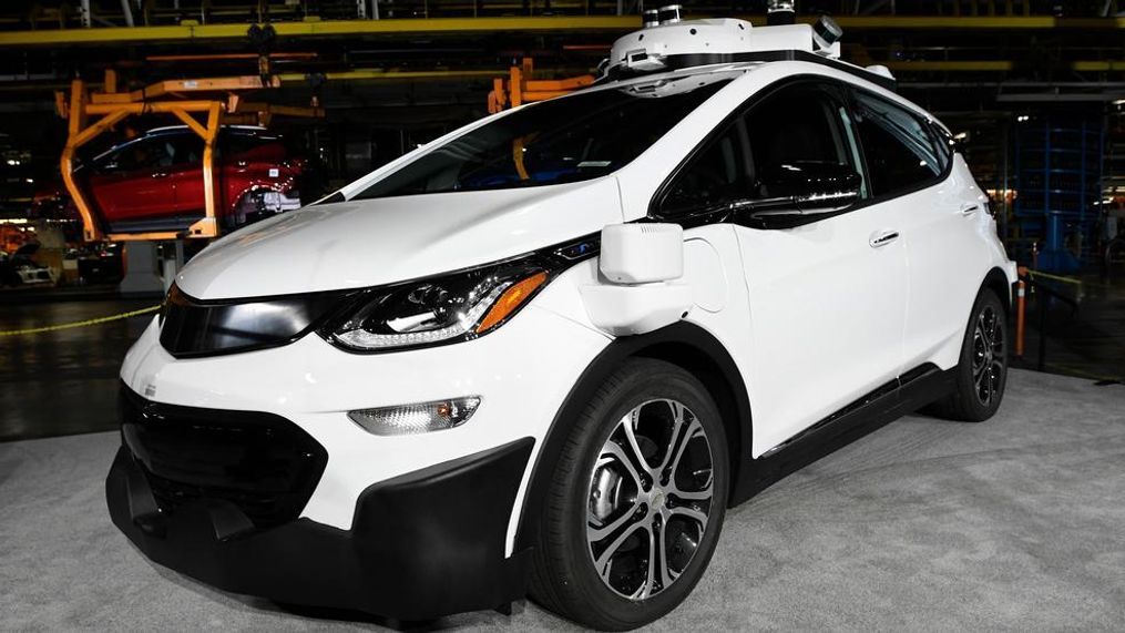 In this Tuesday, June 13, 2017, file photo, a self-driving Chevrolet Bolt EV that is in General Motors Co.'s autonomous vehicle development program appears on display at GM's Orion Assembly in Lake Orion, Mich. California regulators are embracing a General Motors recommendation that would help makers of self-driving cars avoid paying for accidents and other trouble, raising concerns that the proposal will put an unfair burden on vehicle owners. (Jose Juarez/Detroit News via AP, File){p}{/p}