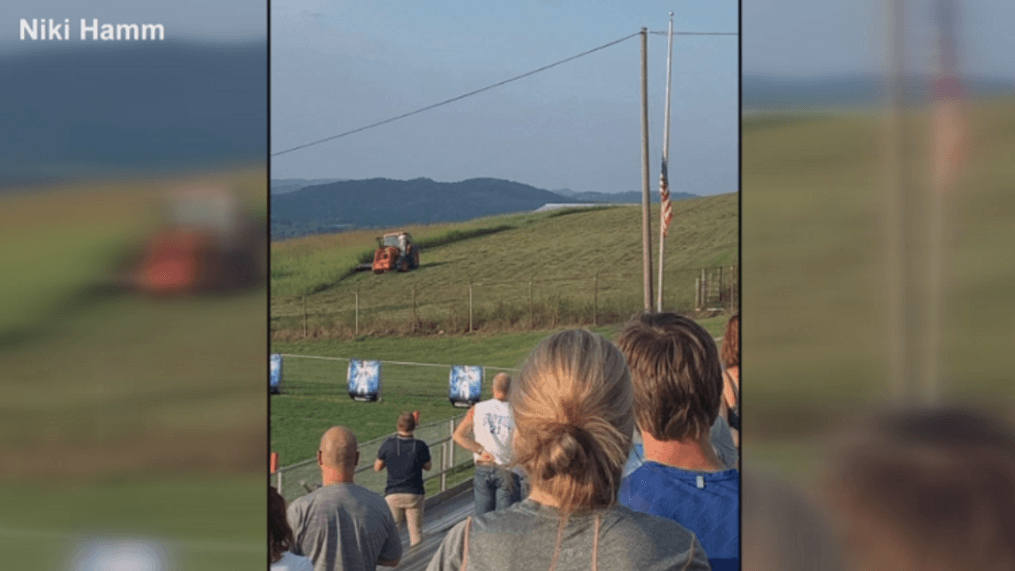 Alex Couch, a farmer standing for the national anthem at Castlewood's home opener (Courtesy: Niki Hamm)