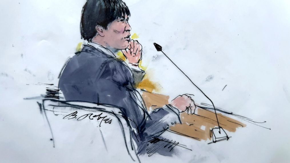 In this courtroom sketch, Ippei Mizuhara, the former longtime interpreter for the Los Angeles Dodgers star Shohei Ohtani appears in federal court in Los Angeles, Friday, April 12, 2024, on a single count of bank fraud. Prosecutors allege that Mizuhara stole more than $16 million from Ohtani to cover gambling bets and debts. (Bill Robles via AP)