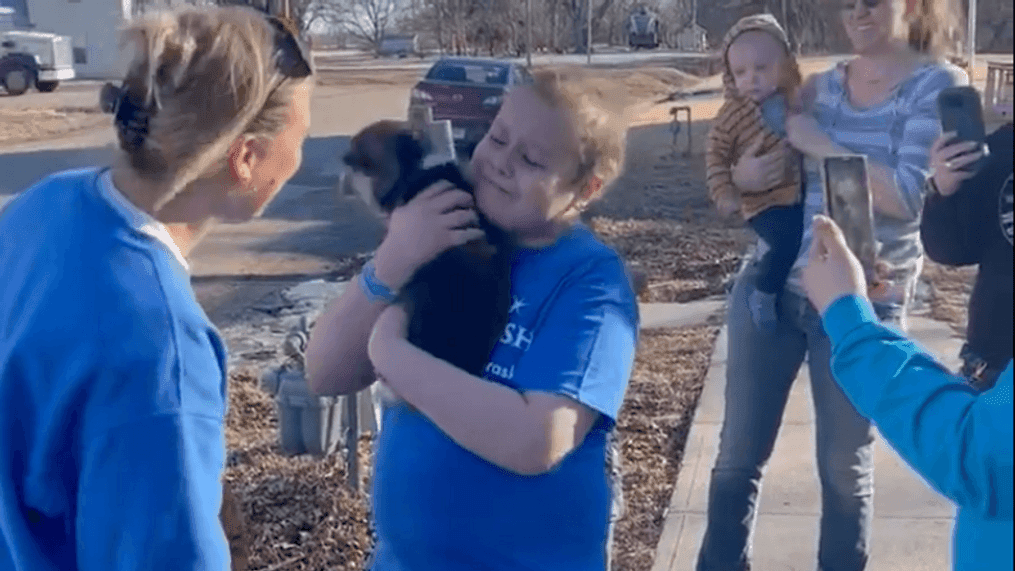 Make-A-Wish Nebraska gives an 11-year-old boy a puppy on Feb. 20, 2023. (Make-A-Wish Nebraska)