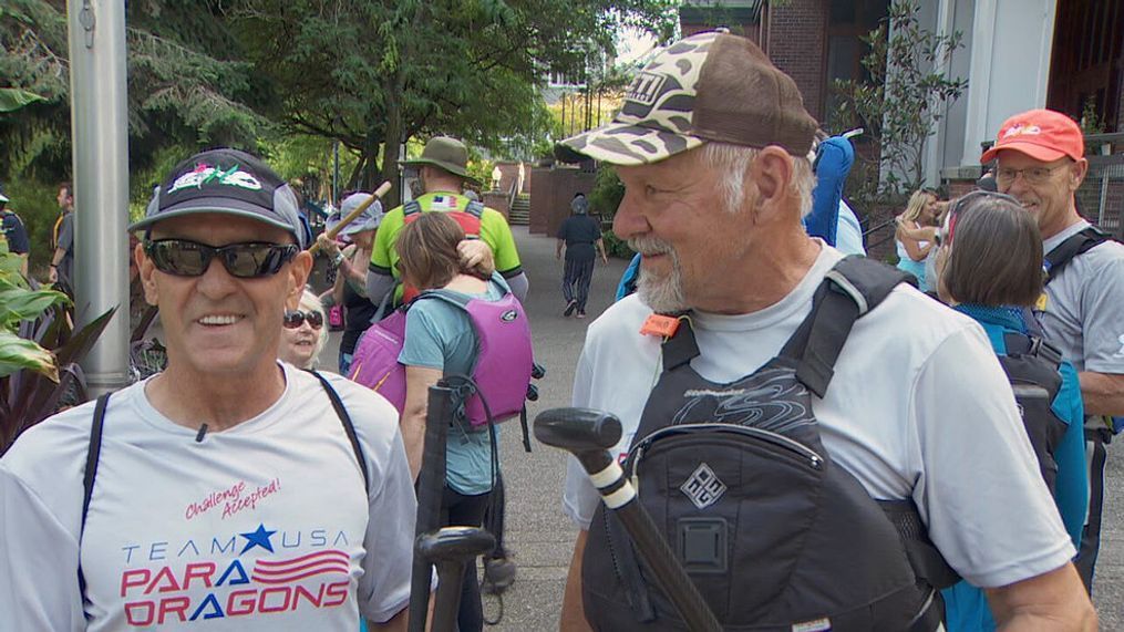 Brinton Olsen (left) and his coach Jim Himsvark. (KATU)