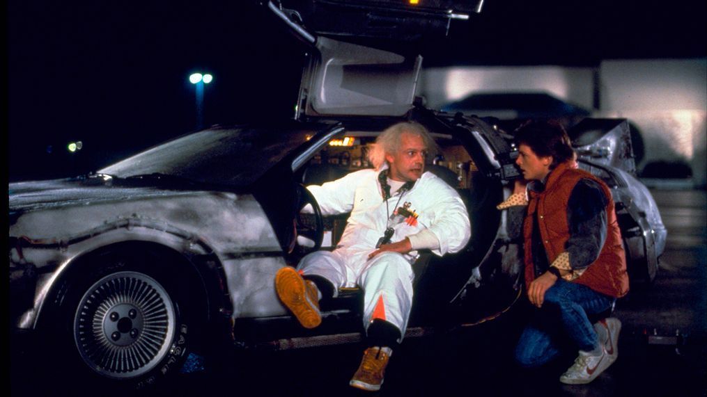 This photo provided by Universal Pictures Home Entertainment shows Christopher Lloyd, left, as Dr. Emmett Brown, and Michael J. Fox as Marty McFly in the 1985 film, "Back to the Future."{&nbsp;} (Universal Pictures Home Entertainment via AP)