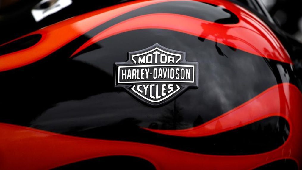 FILE - This April 27, 2017, file photo shows the Harley-Davidson name on the gas tank of a bike in Glenview, Ill. The iconic American motorcycle company, facing dwindling sales in its home market, said Monday, July 30, 2018, that it would be rolling out some new products, and stores, to broaden its audience and hopefully, invigorate sales. (AP Photo/Nam Y. Huh, File)