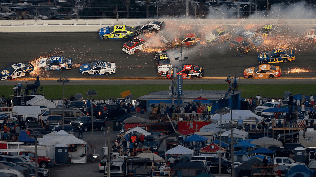 DAYTONA BEACH, FL - FEBRUARY 17:  Paul Menard, driver of the #21 Motorcraft/Quick Lane Tire & Auto Center Ford, wrecks during the Monster Energy NASCAR Cup Series 61st Annual Daytona 500 at Daytona International Speedway on February 17, 2019 in Daytona Beach, Florida.  (Photo by Brian Lawdermilk/Getty Images)