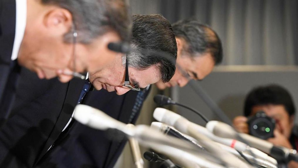 Suzuki Motor Corp. Representative Director and President Toshihiro Suzuki, second from left, bows with other official at the start of a press conference Thursday Aug. 9, 2018 in Tokyo. Suzuki Motor Corp., Mazda Motor Corp. and Yamaha Motor Co. have admitted using falsified emissions data to inspect their new vehicles in a product quality scandal in Japan's auto industry. (Akiko Matsushita/Kyodo News via AP)