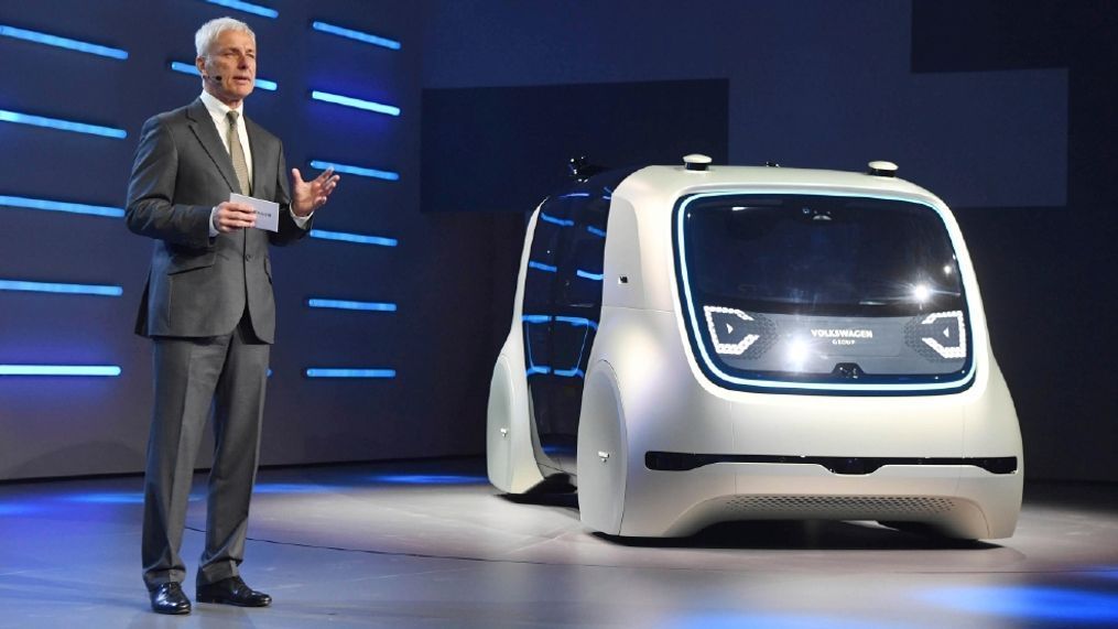 Matthias Mueller, the CEO of Volkswagen, presents VW autonomous concept car Sedric, at the 87th Geneva International Motor Show in Geneva, Switzerland, Monday March 6, 2017. (Uli Deck/dpa via AP)