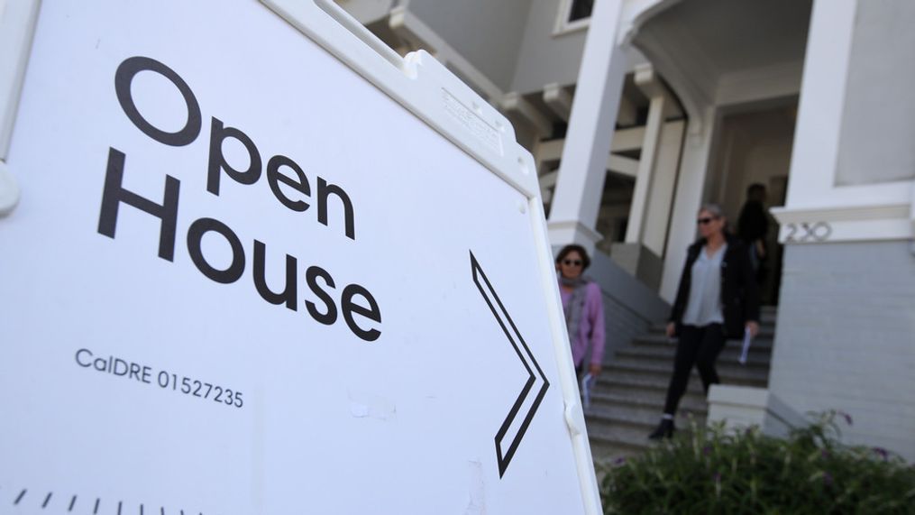 FILE - Real estate agents leave a home for sale during a broker open house on April 16, 2019, in San Francisco. (Photo by Justin Sullivan/Getty Images)