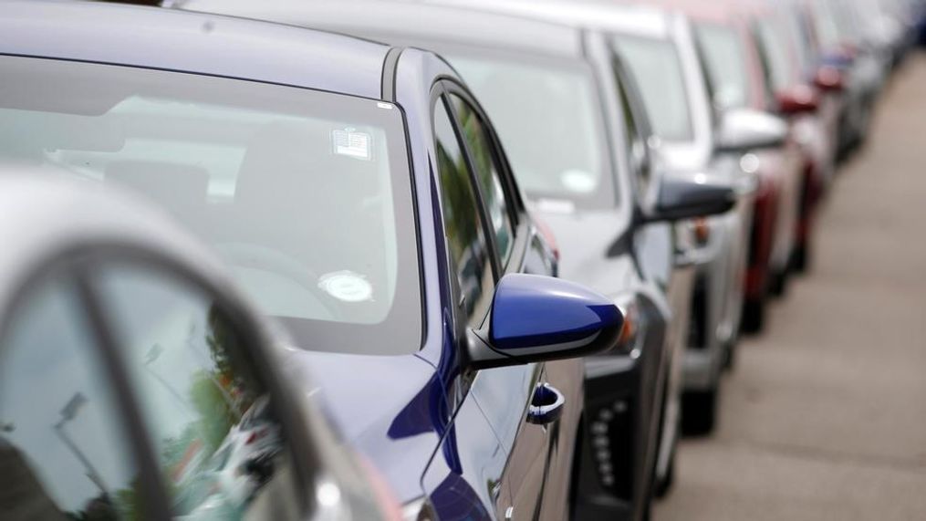 In this May 19, 2019, file photograph, a long line of unsold 2019 sedans sits at a dealership in Littleton, Colo. The annual survey by J.D. Power found that as the electronic safety systems find their way into more mainstream models, buyers are reporting more issues in their first three months of ownership. The problems are more than just a pain for new-vehicle owners. They affecting systems that are “critical for building consumer trust in future automated vehicles,” said Dave Sargent, J.D. Power’s vice president of global automotive. (AP Photo/David Zalubowski, File)