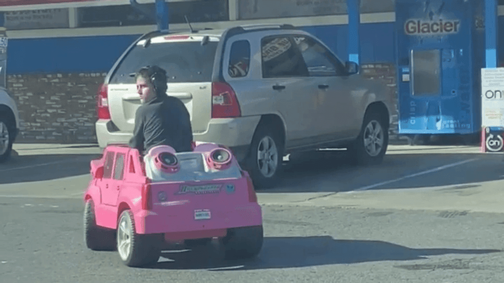 A Visalia man was casually going through his day when he spotted a young boy pulling up to the neighborhood store to buy stuff on a pink toy car. (Photo: Eric Sapien)