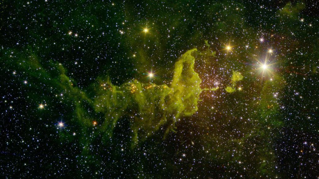 This composite image made available by NASA shows the spider part of "The Spider and the Fly" nebulae, IC 417, where many stars are formed, captured in infrared by the Spitzer Space Telescope and the Two Micron All Sky Survey (2MASS). Located in the constellation Auriga, it is about 10,000 light-years away from Earth in the outer part of the Milky Way, almost exactly in the opposite direction from the galactic center. (NASA/JPL-Caltech via AP)