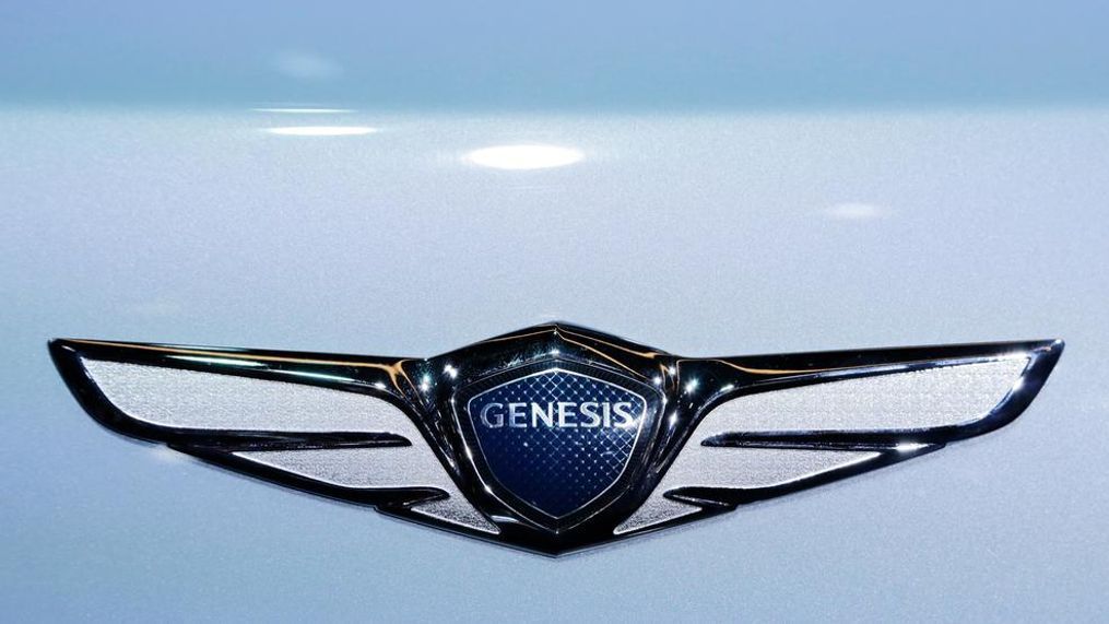 In this March 24, 2016, file photo, the emblem for the Genesis New York Concept is displayed at the New York International Auto Show. The annual survey by J.D. Power finds that buyers reported a record-low 93 problems per 100 vehicles during the first three months of ownership, four problems fewer than last year. The survey also found that Korean brands Genesis, Kia and Hyundai claimed the top three spots for the first time in new vehicle quality. (AP Photo/Mark Lennihan, File)