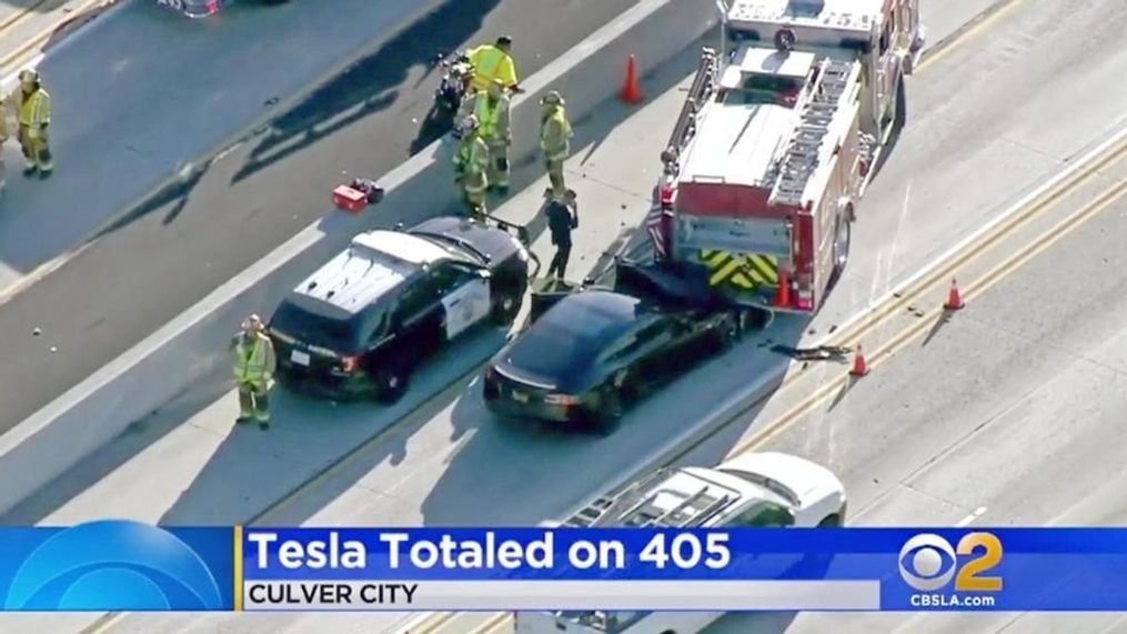 This Jan. 22, 2018, file still frame from video provided by KCBS-TV shows a Tesla Model S electric car that has crashed into a fire engine on Interstate 405 in Culver City, Calif. A government report says the driver of the Tesla that slammed into a firetruck was using the car’s Autopilot system when a vehicle in front of him suddenly changed lanes and he didn’t have time to react. The National Transportation Safety Board said Tuesday, Sept. 3, 2019, that the driver never saw the parked firetruck and didn’t brake. (KCBS-TV via AP, File)