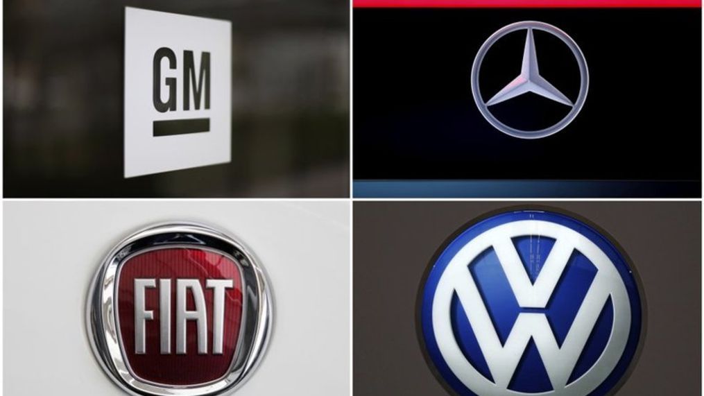 This undated combination of photos shows clockwise from top left, the General Motors logo at the company’s world headquarters in Detroit, the logo of Mercedes EQ concept car at the company’s headquarters in Stuttgart, Germany, the Fiat logo on a 2018 Fiat automobile on display at the Pittsburgh Auto Show and a Volkswagen logo on display at the Pittsburgh Auto Show. Three class actions filed Wednesday, March 14, 2018, allege that General Motors, Fiat Chrysler, Volkswagen and Mercedes knew of problems with exploding Takata air bag inflators yet waited years to issue recalls. (AP Photo){&nbsp;}{p}{/p}