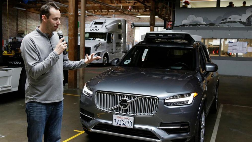 In this photo taken Tuesday, Dec. 13, 2016, file photo, Anthony Levandowski, then-head of Uber's self-driving program, speaks about their driverless car in San Francisco. A Google-bred pioneer in self-driving cars will collide with Uber's beleaguered ride-hailing service in a courtroom showdown Monday, Feb. 4, 2018, revolving around allegations of deceit, betrayal, espionage and a high-tech heist that tore apart one-time allies. (AP Photo/Eric Risberg, File){p}{/p}