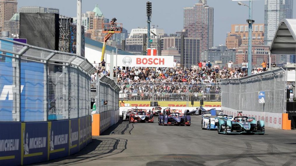 Drivers in the Formula E season finale compete in the auto race in the Brooklyn borough of New York on Saturday, July 13, 2019. (AP Photo/Avery Yang)