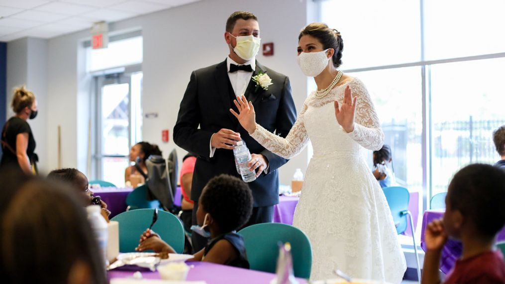 On August 15th, Melanie and Tyler Tapajna were married in front of families and friends, but the couple had to cancel their wedding reception because of to the COVID-19 pandemic. So, the couple donated and served their reception food to Laura's Home in Cleveland, Ohio.  (Courtesy: Caroline Stoltzfus/The City Mission) 