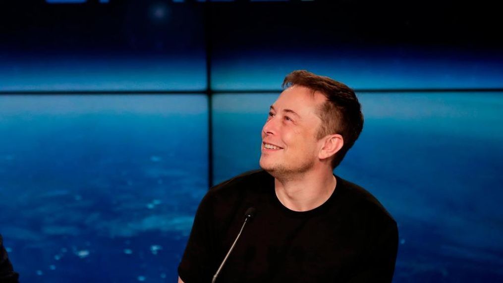 In this Feb. 6, 2018, file photo, Elon Musk, founder, CEO, and lead designer of SpaceX, speaks at a news conference from the Kennedy Space Center in Cape Canaveral, Fla. Musk is set to unveil an underground transportation tunnel that could move people faster than subways. Musk plans to unveil the test tunnel Tuesday, Dec. 18, 2018, as well as the autonomous cars that will carry people through it. He's also set to show off elevators he says will bring users' own cars from the surface to the tunnel. (AP Photo/John Raoux, File)