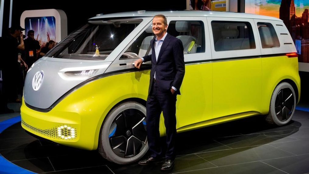 In a Jan. 9, 2017, file photo, Herbert Diess, chairman of the Volkswagen brand, poses with the I.D. Buzz all-electric concept van, at the North American International Auto Show, in Detroit. Volkswagen's supervisory board on Thursday, April 12, 2018 appointed Diess as CEO of the Volkswagen concern. (AP Photo/Tony Ding, File)