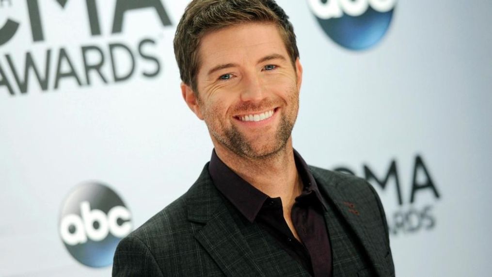 FILE - In this Nov. 5, 2014 file photo, Josh Turner arrives at the 48th annual CMA Awards at the Bridgestone Arena, in Nashville, Tenn. Authorities in central California say a passenger bus has crashed while carrying the road crew for the country and gospel singer. Turner and his band were not on the bus. The bus was traveling eastbound on Highway 46 in San Luis Obispo County when it crashed in Shandon late Wednesday night, Sept. 18, 2019. The trip followed a Turner concert at the Vina Robles Amphitheatre in Paso Robles, according to media reports. (Photo by Evan Agostini/Invision/AP, File)