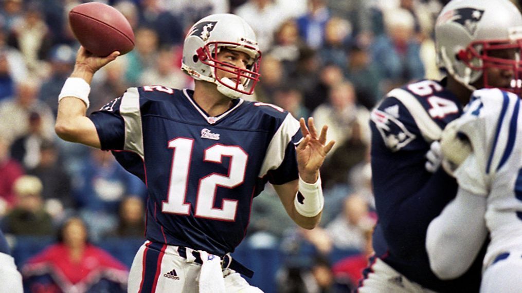 FILE - In this Sept. 30, 2001 file photo, New England Patriots quarterback Tom Brady (12) passes during Brady's first start of an NFL football game against the Indianapolis Colts in Foxborough, Mass.  Brady, who won a record seven Super Bowls for New England and Tampa, has announced his retirement, Wednesday, Feb. 1, 2023.  (AP Photo/Winslow Townson, File)