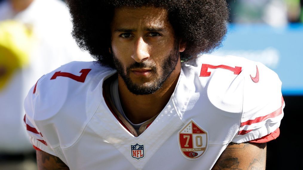 FILE - In this Sept. 25, 2016, file photo, San Francisco 49ers quarterback Colin Kaepernick kneels during the national anthem before an NFL football game against the Seattle Seahawks in Seattle. (AP Photo/Ted S. Warren, File)