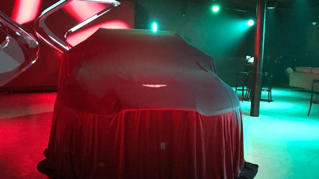 Aston Martin DBX under wraps at a recent sneak peek in Austin, Texas. (Sinclair Broadcast Group / Jill Ciminillo)