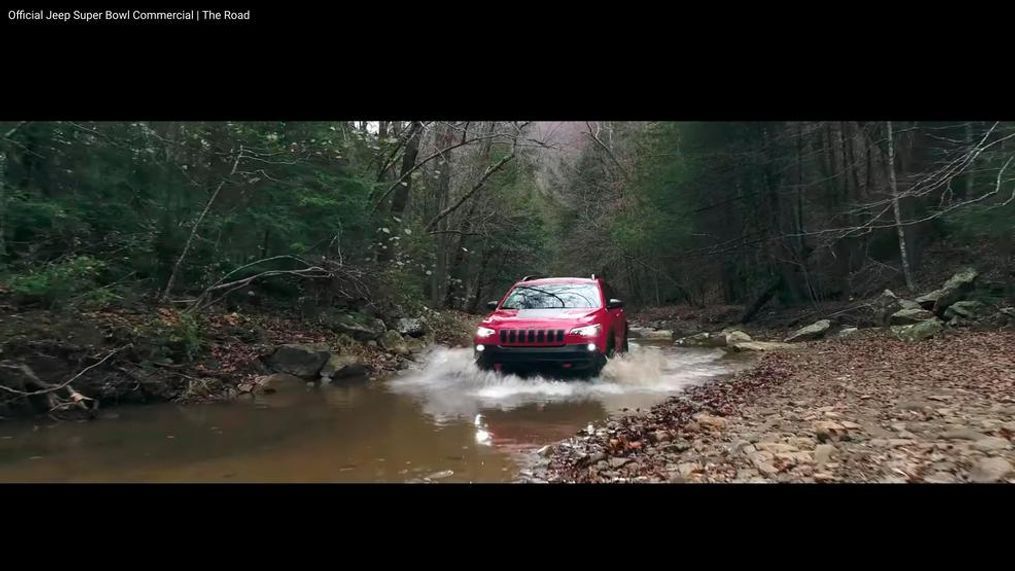 This image made video obtained from the Jeep brand YouTube channel of Fiat Chrysler Automobiles shows part of its commercial video aired during the Super Bowl on Sunday, Feb. 4, 2018. The head of one of the nation's largest fish conservation groups says Fiat Chrysler Super Bowl ads "glorified" the destruction of aquatic habitat in an apparent attempt to appeal to off-road thrill seekers. (Fiat Chrysler Automobiles via AP)