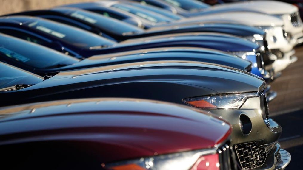 In this Sunday, Jan. 7, 2018, photograph, a long line of unsold 2017 and 2018 Maserati Levantes sits on a dealer's lot in Highlands Ranch, Colo. Industry analysts expect February 2018 sales to tail off from a year ago as automakers ease up on cash discounts and other incentives that hit record highs last year. Most automakers report sales figures Thursday, March 1. (AP Photo/David Zalubowski)