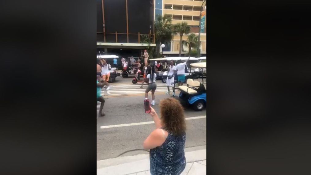 Large crowd dancing on Ocean Boulevard (King Yari Fields).JPG