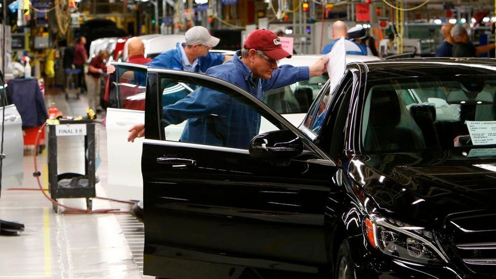 In this Feb. 14, 2017, file photo, employees do assembly and quality control work on automobiles at the Mercedes-Benz plant in Tuscaloosa, Ala. If a trade spat between the U.S. and China escalates and both countries raise tariffs, American automakers won’t suffer that much. But German luxury automakers BMW and Mercedes will. Mercedes ships up to 75,000 more from Tuscaloosa County. (Gary Cosby Jr./The Tuscaloosa News via AP, File)