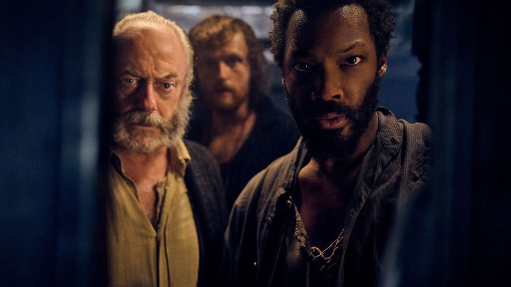 (from left) Captain Eliot (Liam Cunningham), Abrams (Chris Walley) and Clemens (Corey Hawkins) in The Last Voyage of the Demeter, directed by André Øvredal