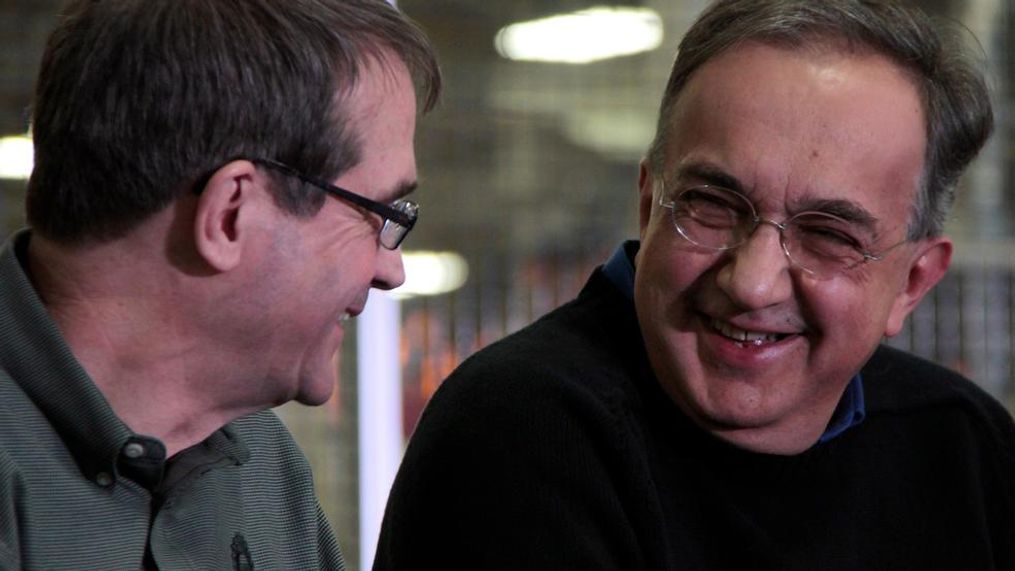 UAW President Bob King (left) shares a laugh with{&nbsp;} Sergio Marchionne during a ceremony at the Chrysler Group’s Sterling Heights (Mich.) Assembly Plant to celebrate the production of the all-new 2015 Chrysler 200 on March 14, 2014.{&nbsp;} (Image courtesy of Fiat Chrysler Automobiles)