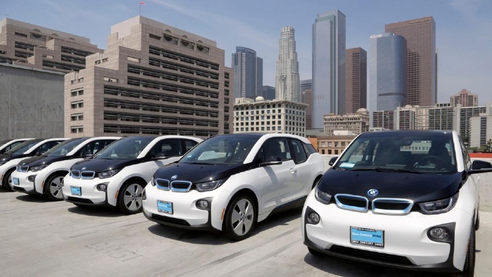 Electric cars parked atop the Los Angeles Police Department parking lot, in Los Angeles.  A California lawmaker told The Associated Press on Friday, Aug. 12,  that she's introducing legislation to require that 15 percent of new vehicles be emission-free in less than a decade, a significant escalation in the state's efforts to speed the evolution of new car technology.  (AP Photo/Nick Ut,File)