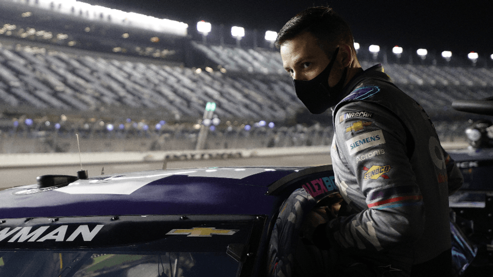 DAYTONA BEACH, FLORIDA - FEBRUARY 10: Alex Bowman, driver of the #48 Ally Chevrolet, enters his car enters his car during qualifying for the NASCAR Cup Series 63rd Annual Daytona 500 at Daytona International Speedway on February 10, 2021 in Daytona Beach, Florida. (Photo by Chris Graythen/Getty Images)