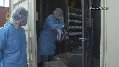 Image for story: Battelle machine able to clean 80,000 surgical masks per day receiving FDA approval