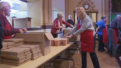 Image for story: Greater Cincinnati church feeds hundreds for longtime Palm Sunday tradition 