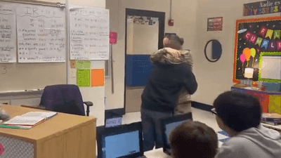 Image for story: Emotional video: Military mom returns for holidays, reunites with her son during English class