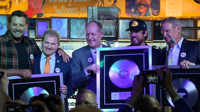 Image for story: Inside a honky tonk, Tennessee governor signs ELVIS Act to protect music industry from AI 