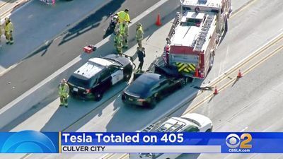 Image for story: 2 federal agencies send teams to probe Tesla freeway crash